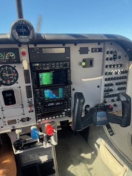 Close-up of the aircraft's instrument panel, showing various gauges and controls.