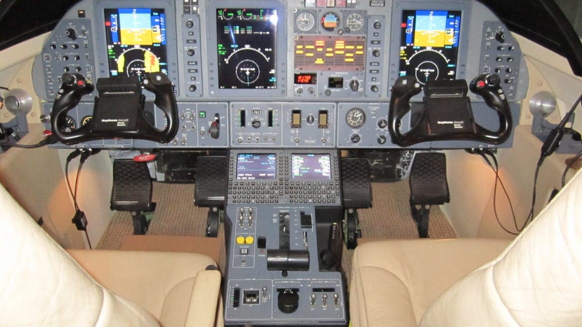 The cockpit instrument panel of an aircraft.