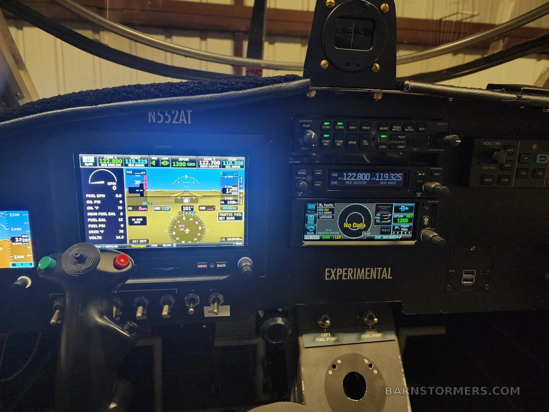 The cockpit of an experimental aircraft shows a Garmin G3X Touch display and other avionics.