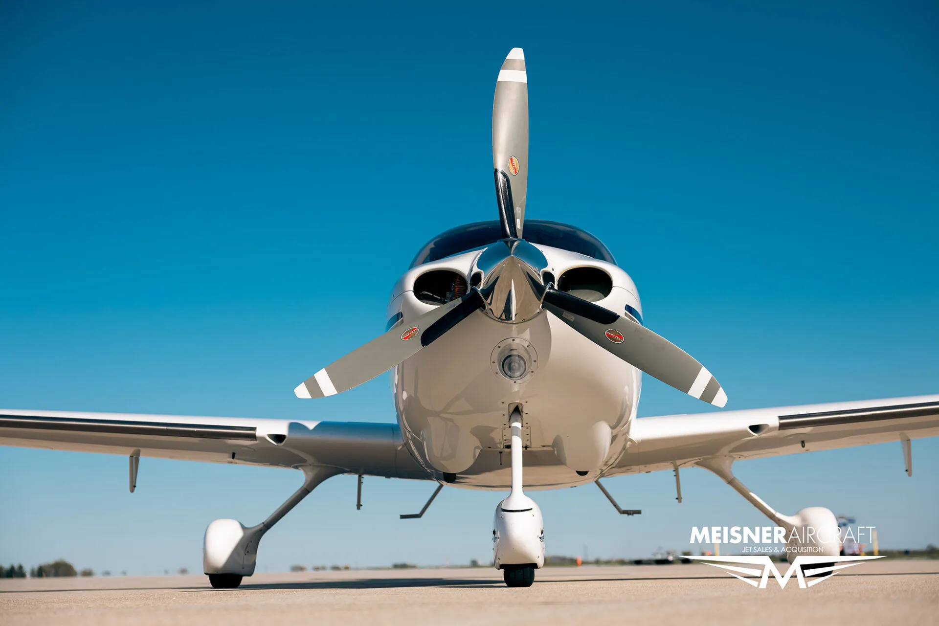 Close-up of the propeller and nose of Cirrus SR22 aircraft, registration N722PB.