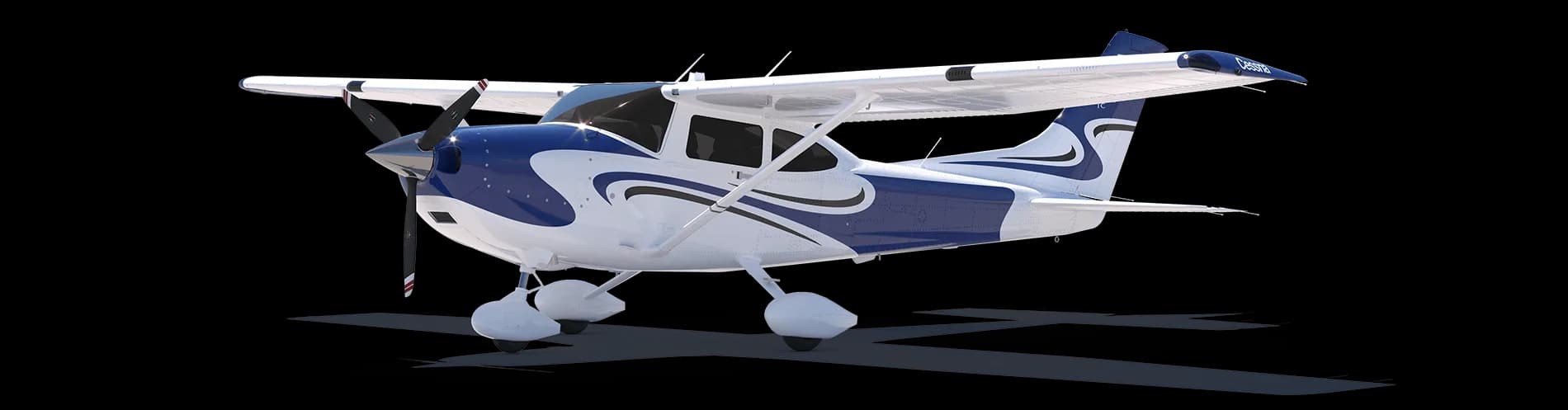 A white and blue Cessna Skylane on a black background.