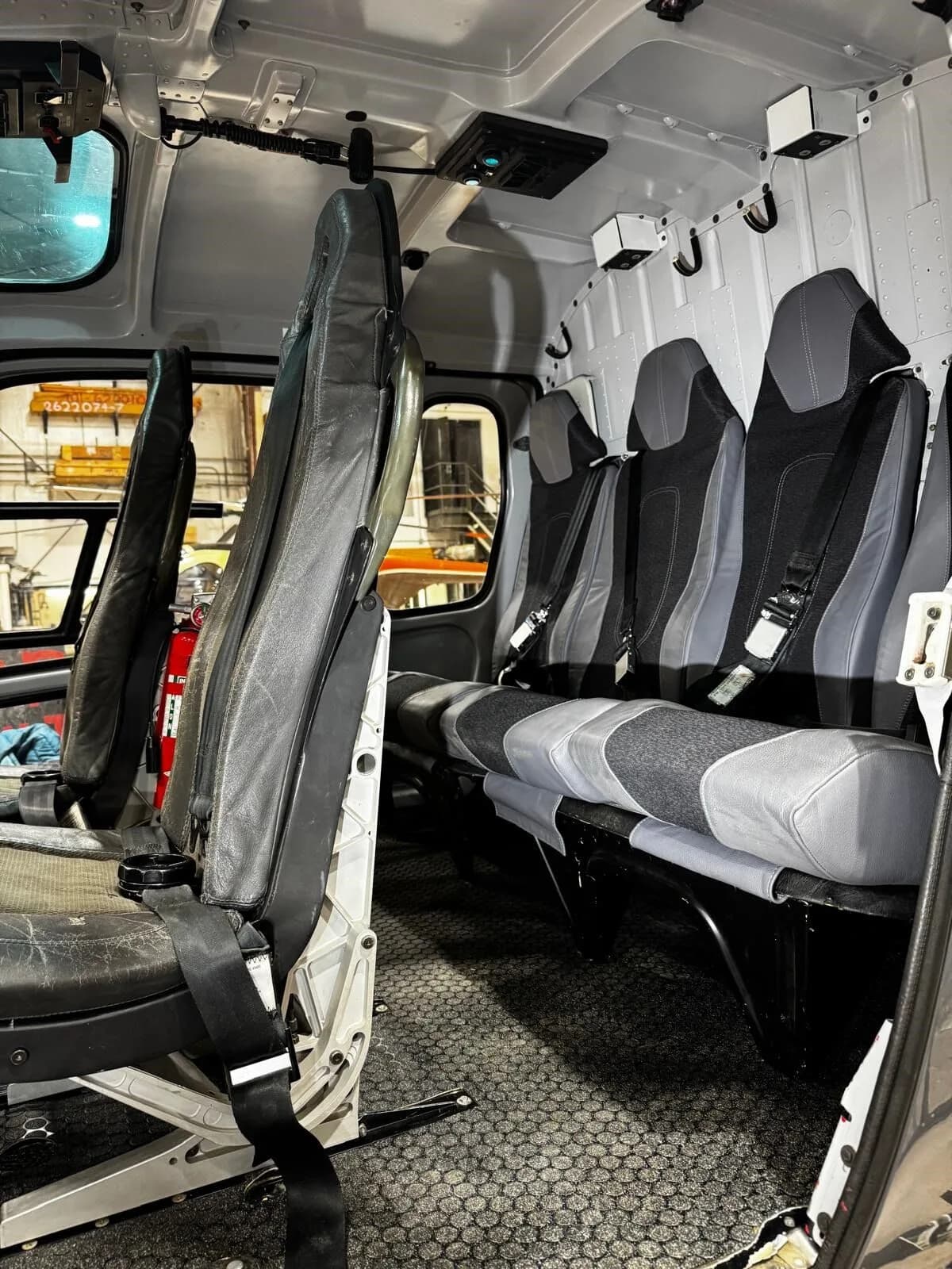 Interior view of the helicopter cabin seats.