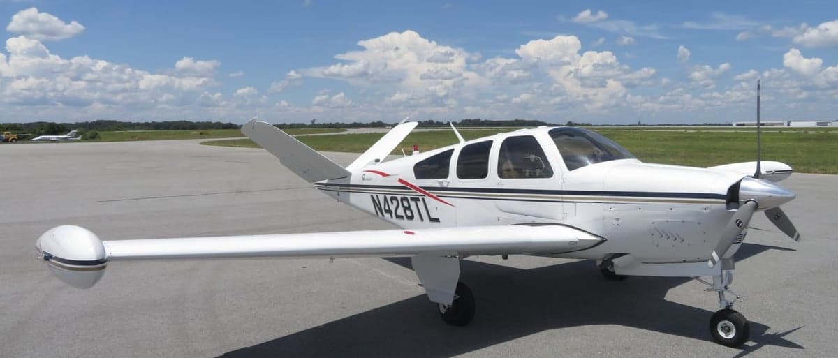 Front quarter view of the Beechcraft Bonanza N428TL on the tarmac.