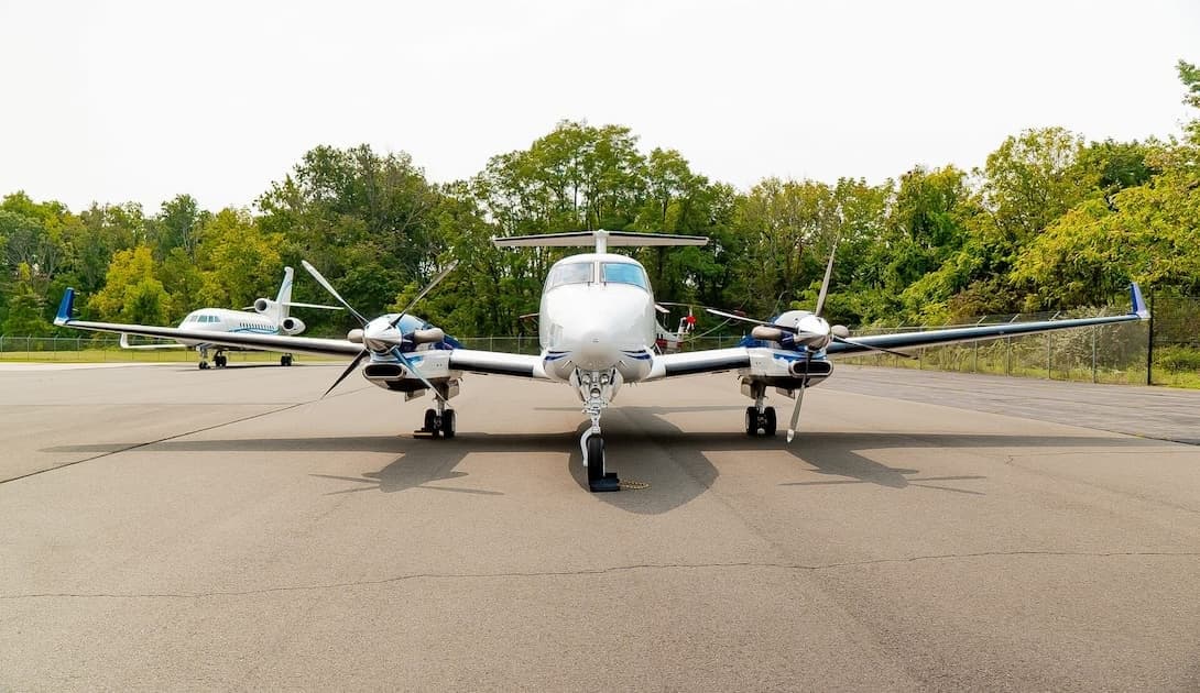 Front view of a Beechcraft King Air on the tarmac.