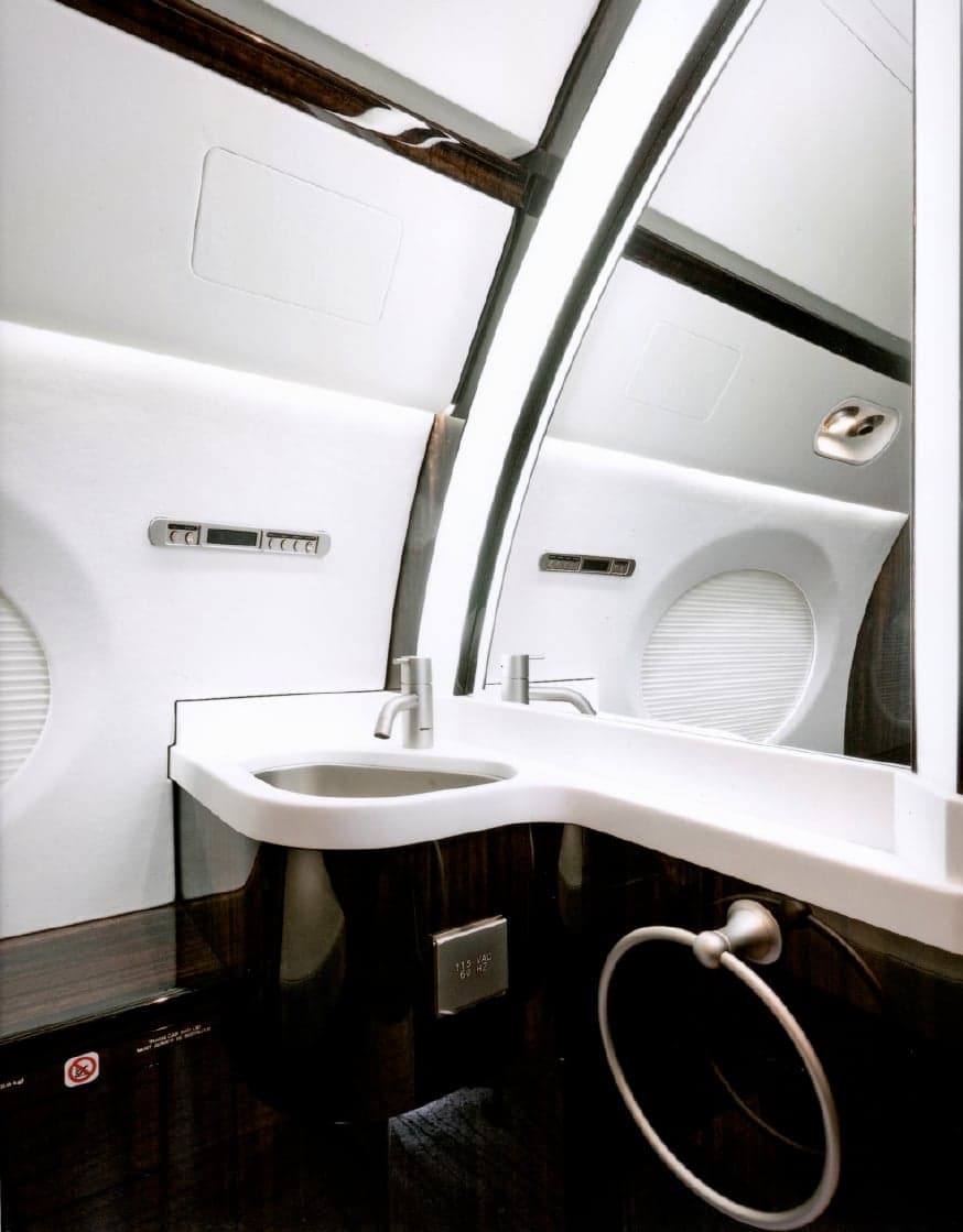 View of the lavatory sink and mirror.