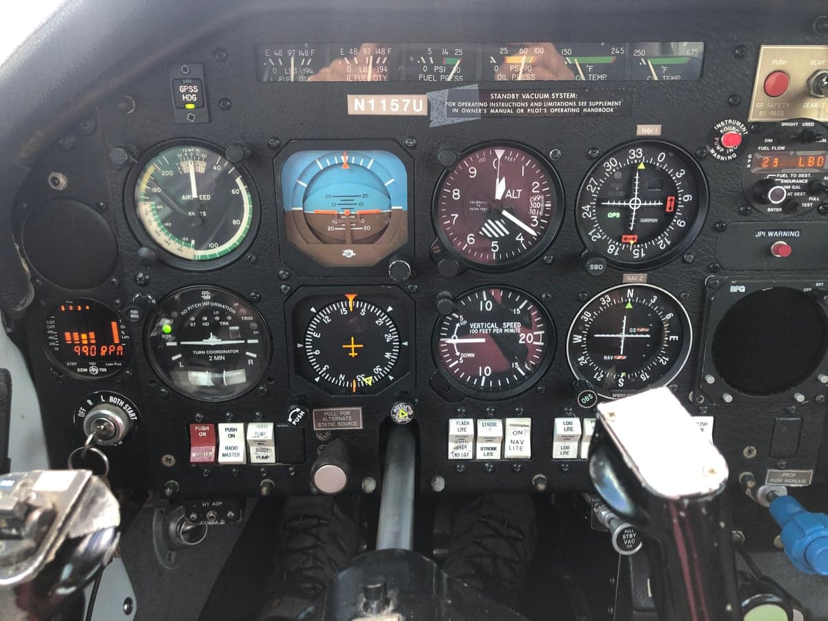 Close-up of the aircraft's instrument panel gauges.