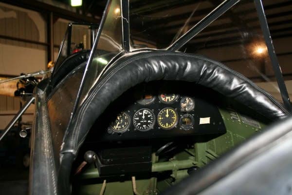 View of the cockpit instrument panel and windscreen.