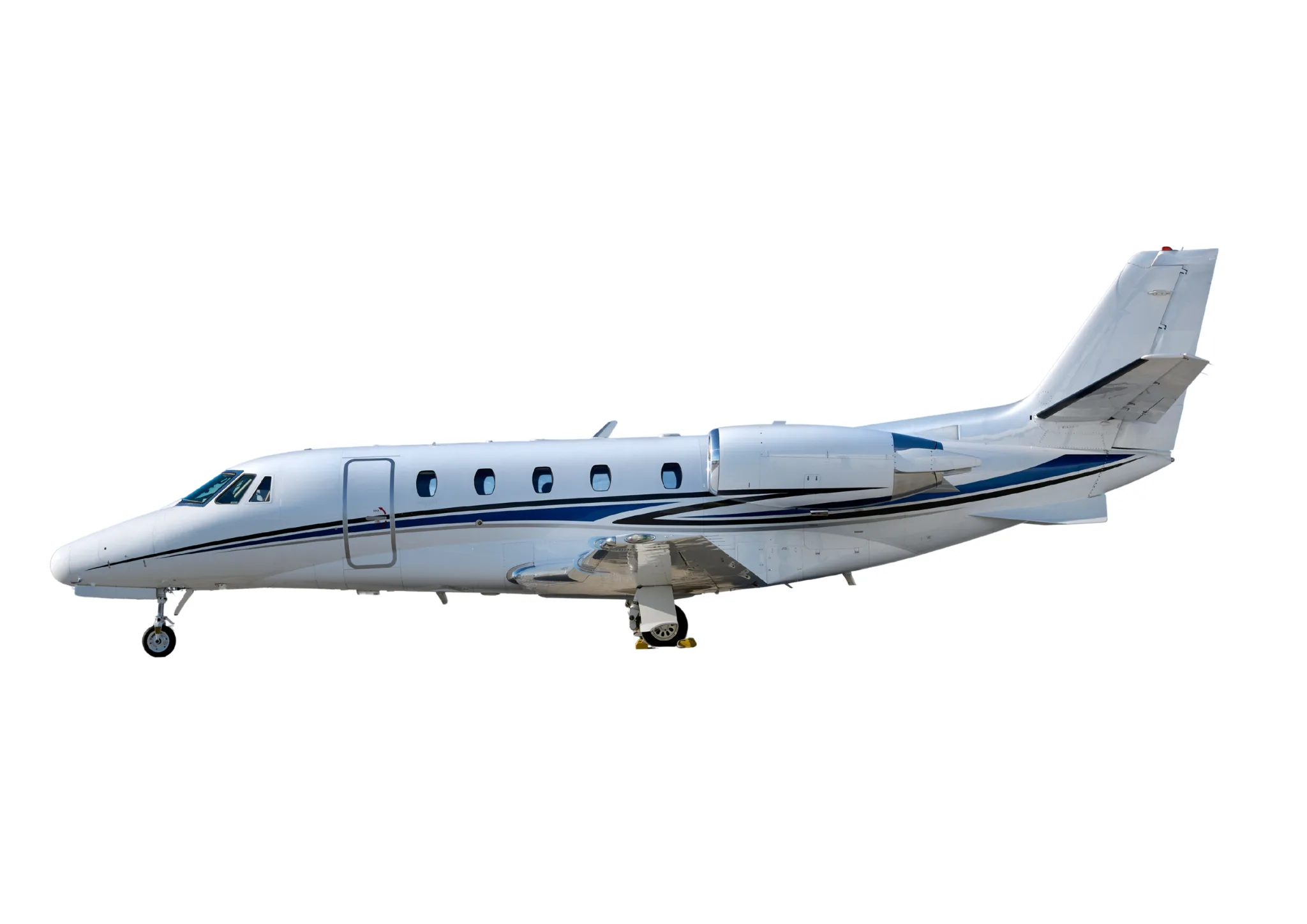 Side view of a white and blue Cessna Citation CJ3 against a white background.
