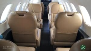 Interior view of the Cessna Citation Bravo cabin with seating arrangement.