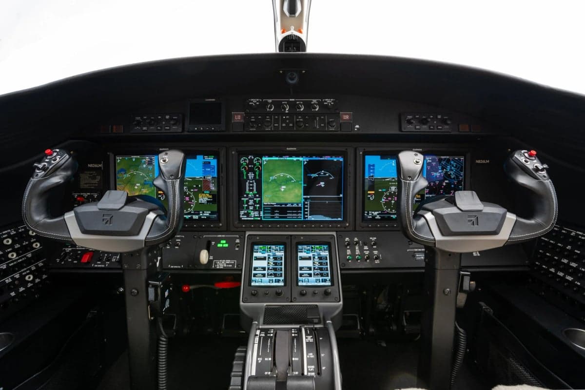 View of the aircraft's cockpit instrument panel and controls.