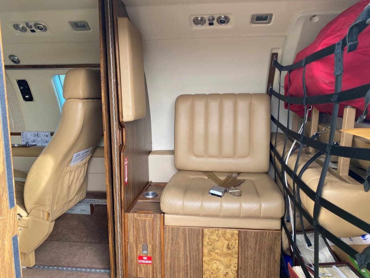 View of the cabin seats and interior details inside the Mitsubishi MU-300 Diamond.