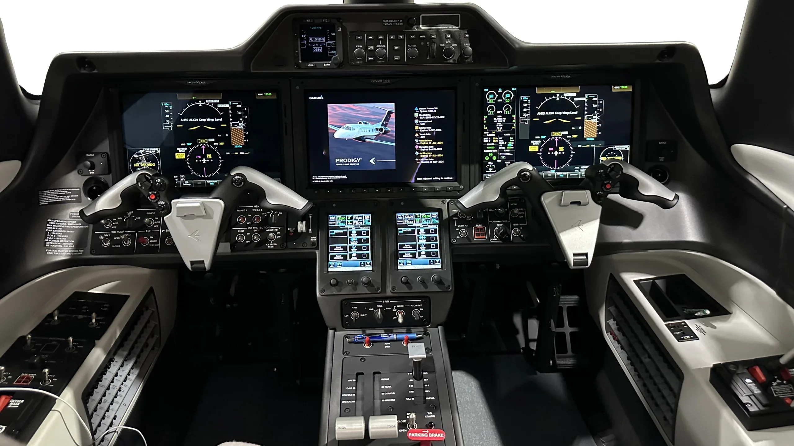 View of the Phenom 300E cockpit instrument panel.