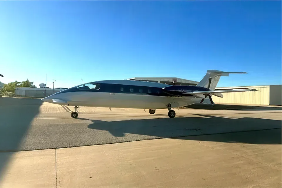 A Piaggio Avanti aircraft parked on the tarmac.