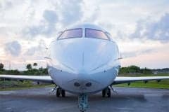 Front view of a Challenger aircraft on the tarmac.