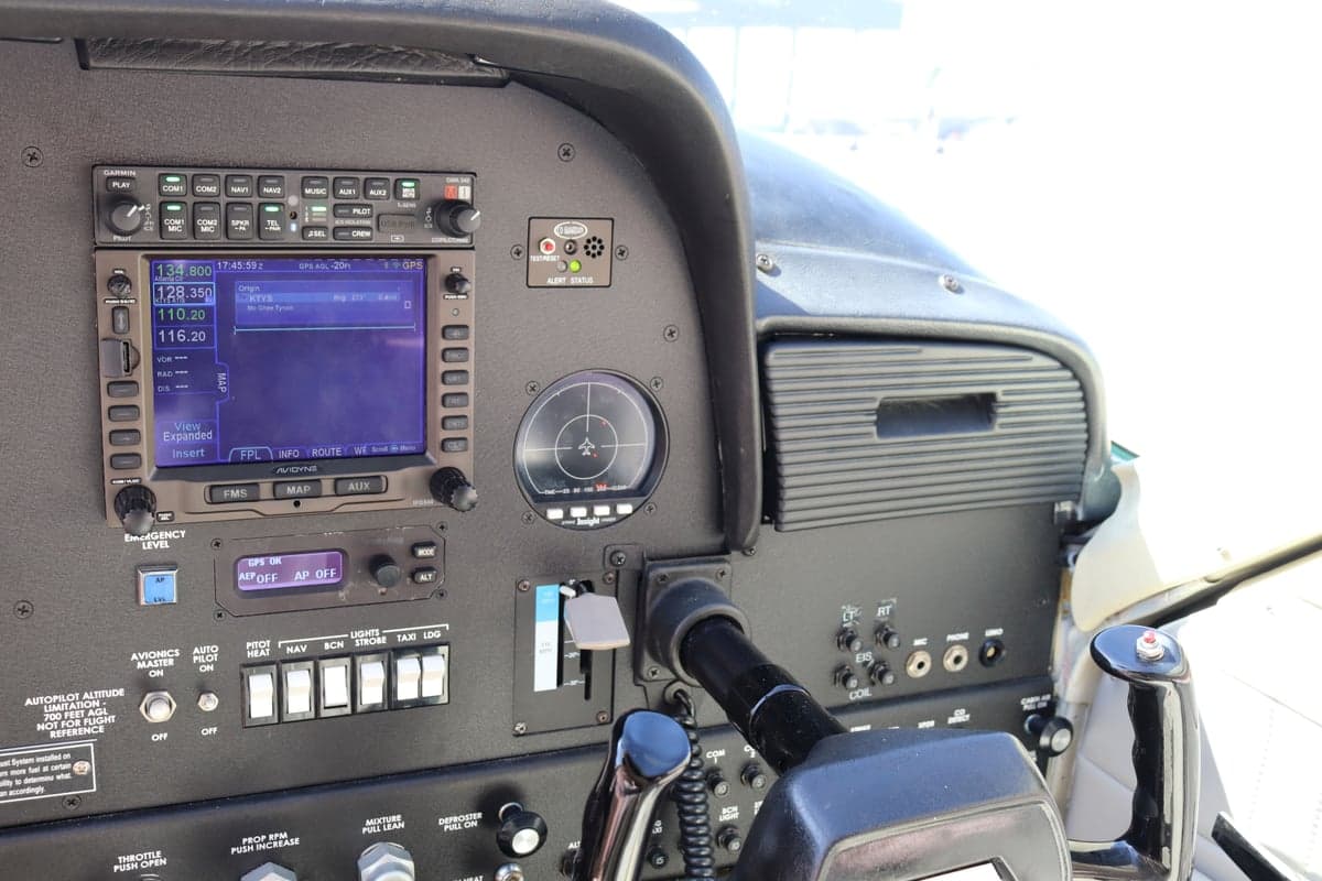 Close-up of the avionics and control panel in the cockpit.