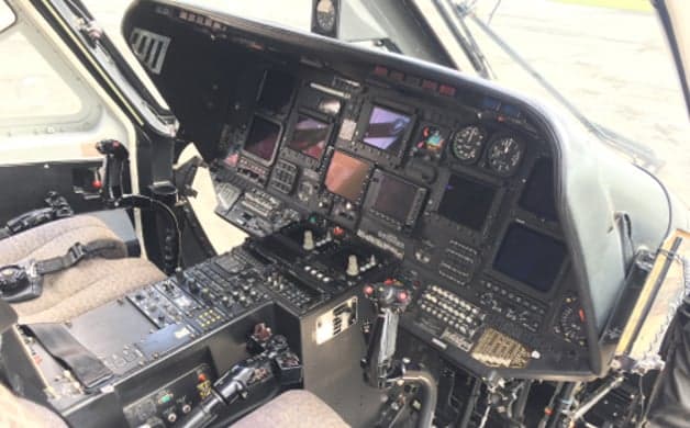 Detailed view of the helicopter's instrument panel.