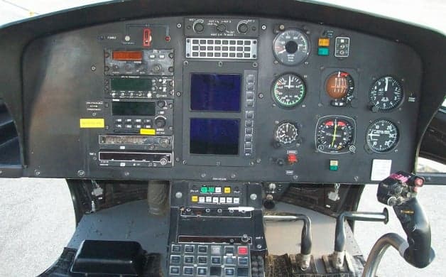 View of the helicopter cockpit from the cabin.