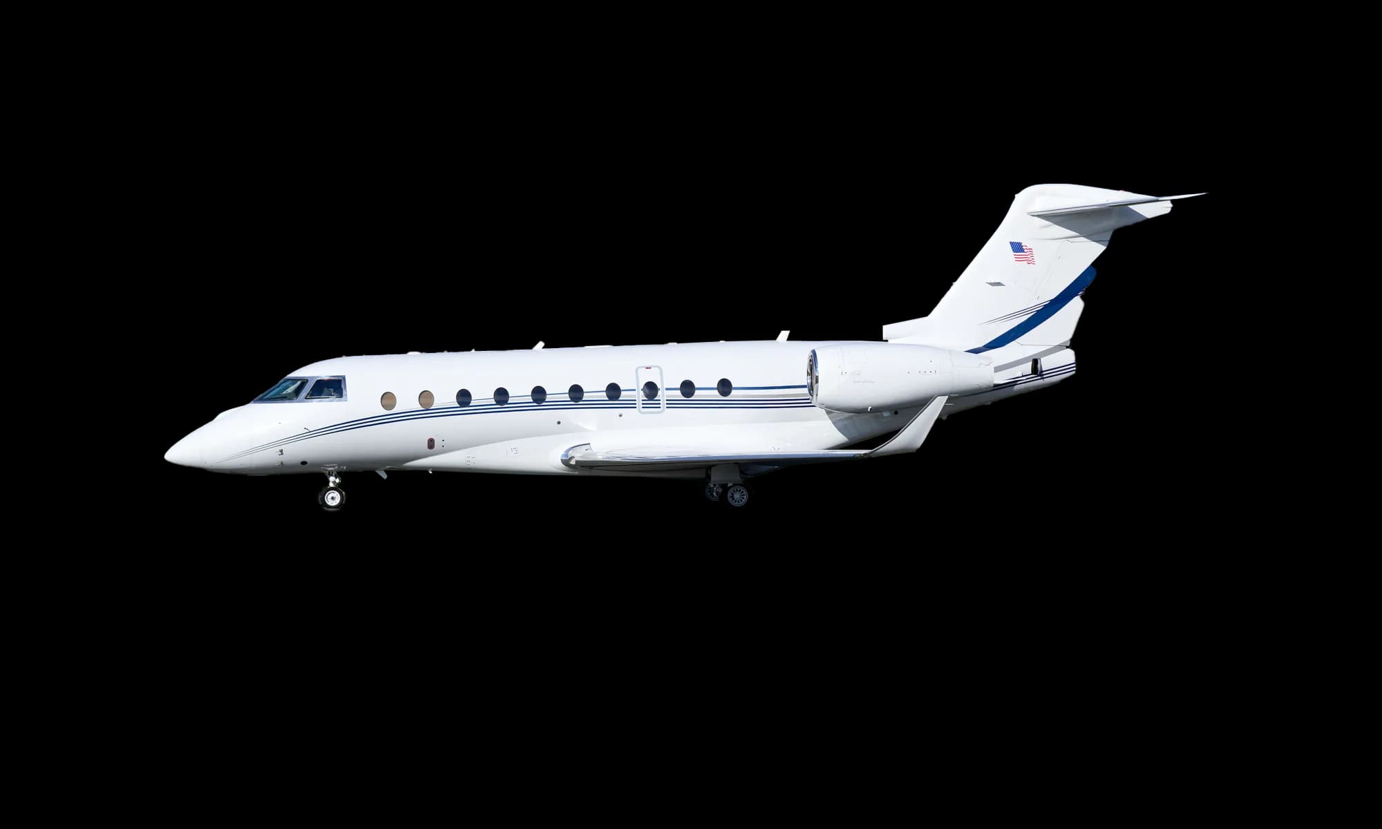 A white Gulfstream business jet with blue stripes on its fuselage and tail, seen from a side profile view on an airfield.