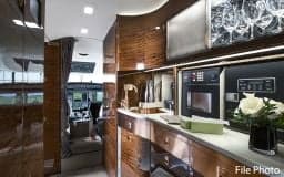 Interior of the Falcon jet with a galley area.