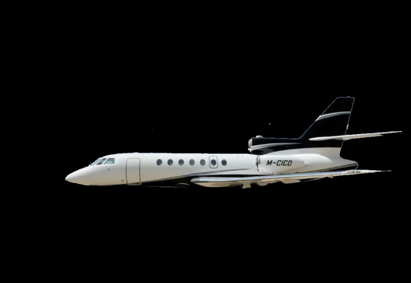 A white business jet with black tail and engine accents, registration M-CICO, seen from the side.