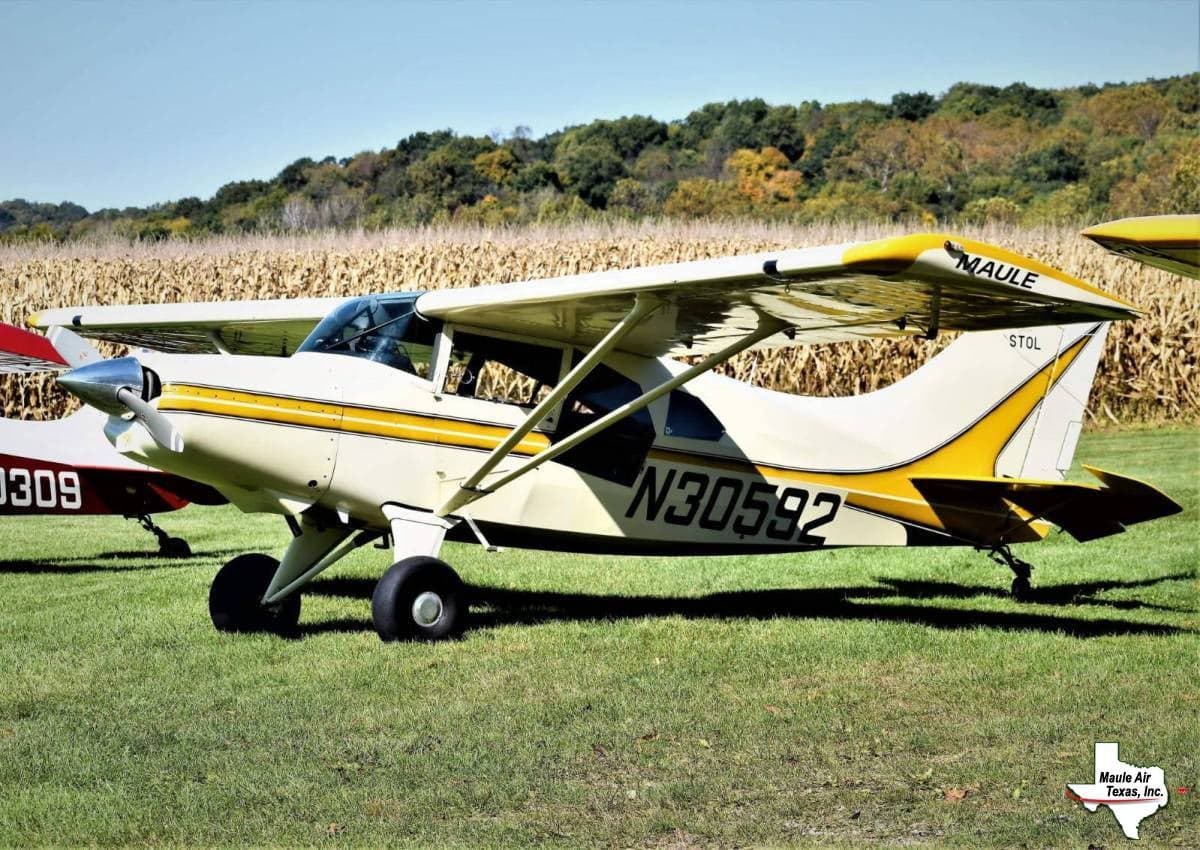 A cream and yellow Maute STOL aircraft with registration N30592 is parked on a grassy field.