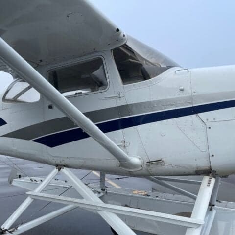 Close-up of the side of the Cessna floatplane.