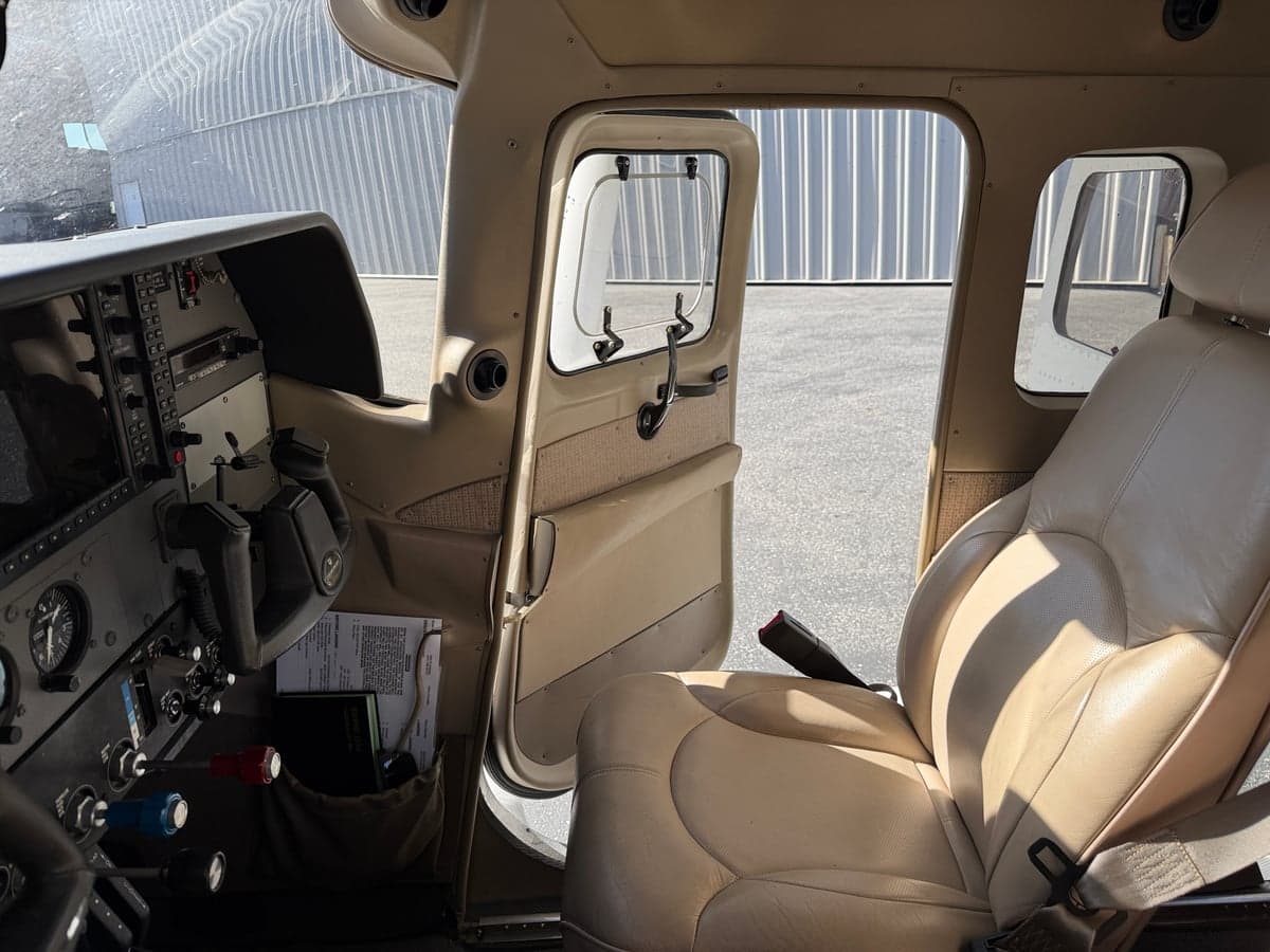 Close-up view of the aircraft's cockpit and front seat.