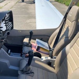 View of the Diamond DA40 cockpit featuring the instrument panel, controls, and seats.