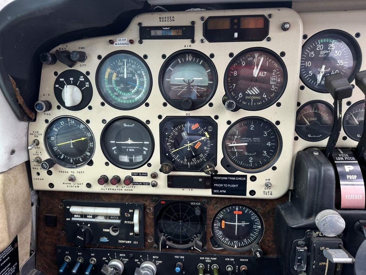Close-up of the aircraft's instrument panel with various gauges and controls.