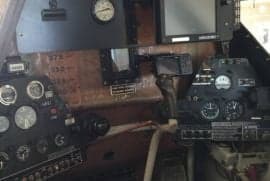 A view of the instrument panel in the cockpit.