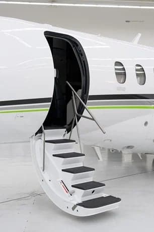 Close-up of the stairs leading into the white jet.