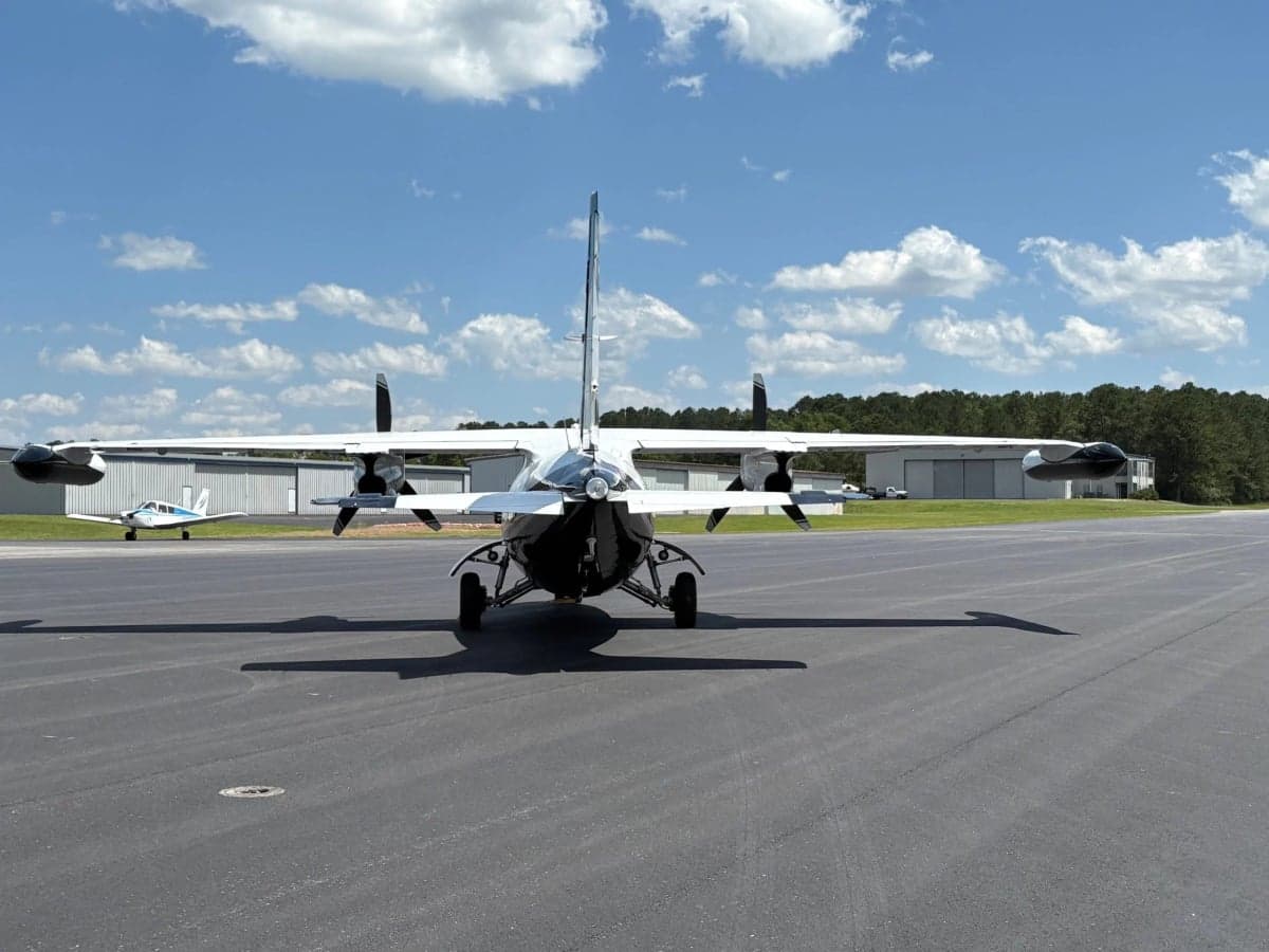 Rear view of the Partenavia P.68 Observer 2 aircraft N616KL on the tarmac.