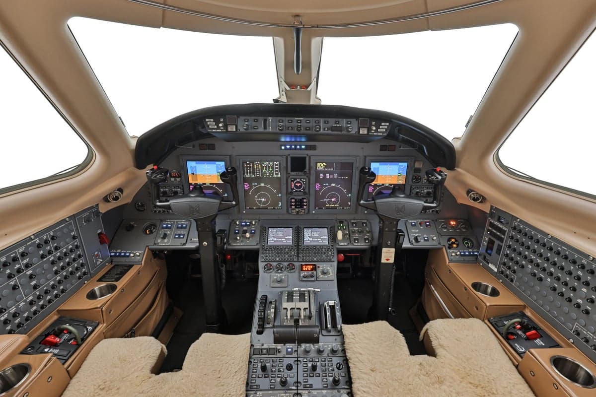 The cockpit of a Citation XLS+ aircraft with a full instrument panel.