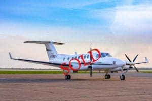 A Beechcraft King Air 350 aircraft with registration N785TR parked on the tarmac with a 'SOLD' overlay.