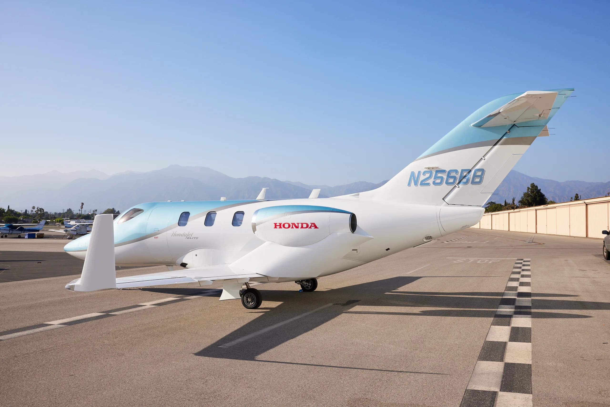 Rear view of a HondaJet Elite with registration N256BB.