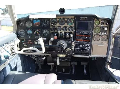 Instrument panel and controls of a Beechcraft Bonanza.