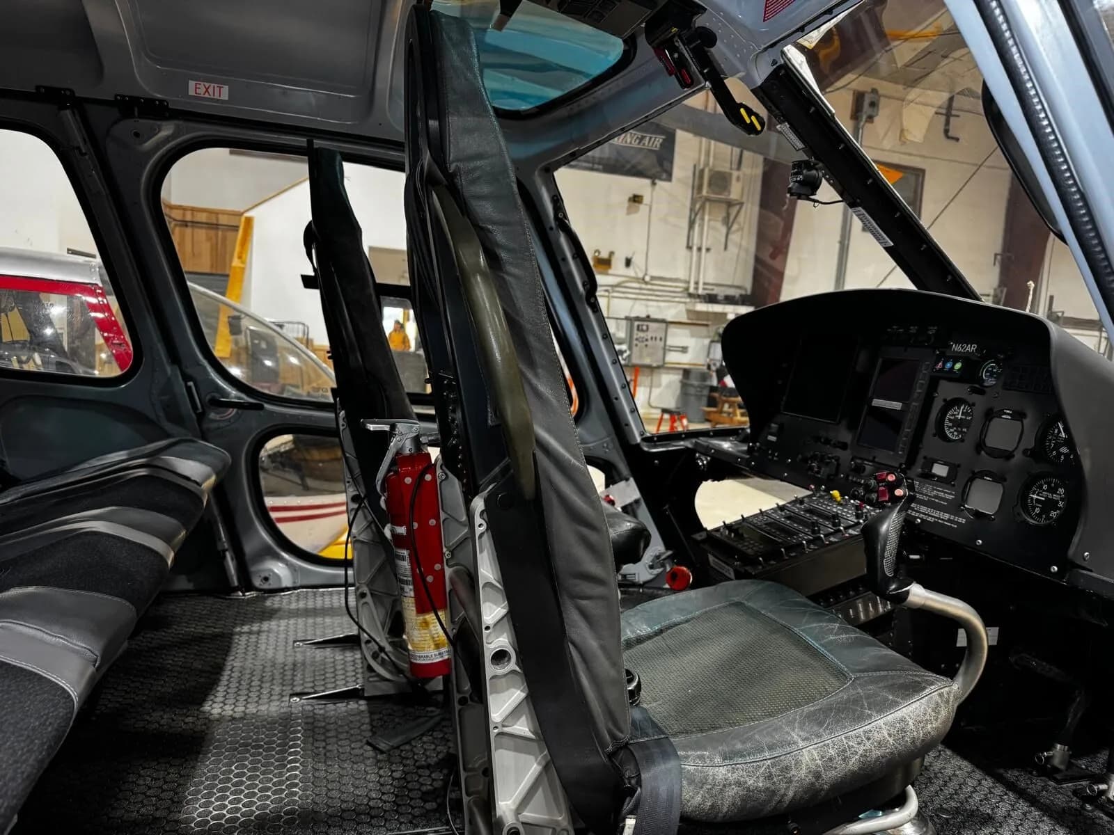 Interior view of the helicopter cabin and cockpit.