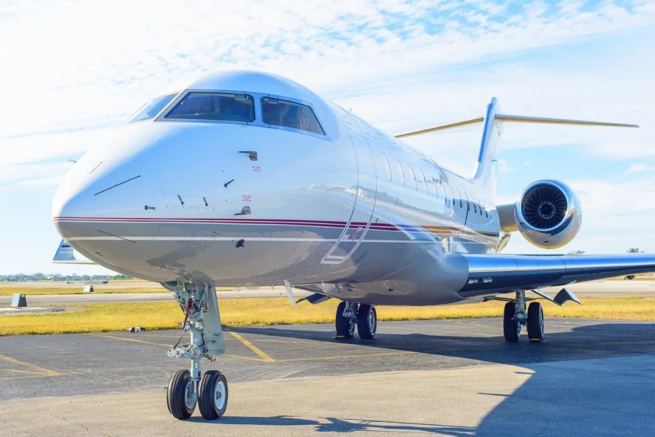 Front view of a Bombardier Challenger aircraft parked on the tarmac.