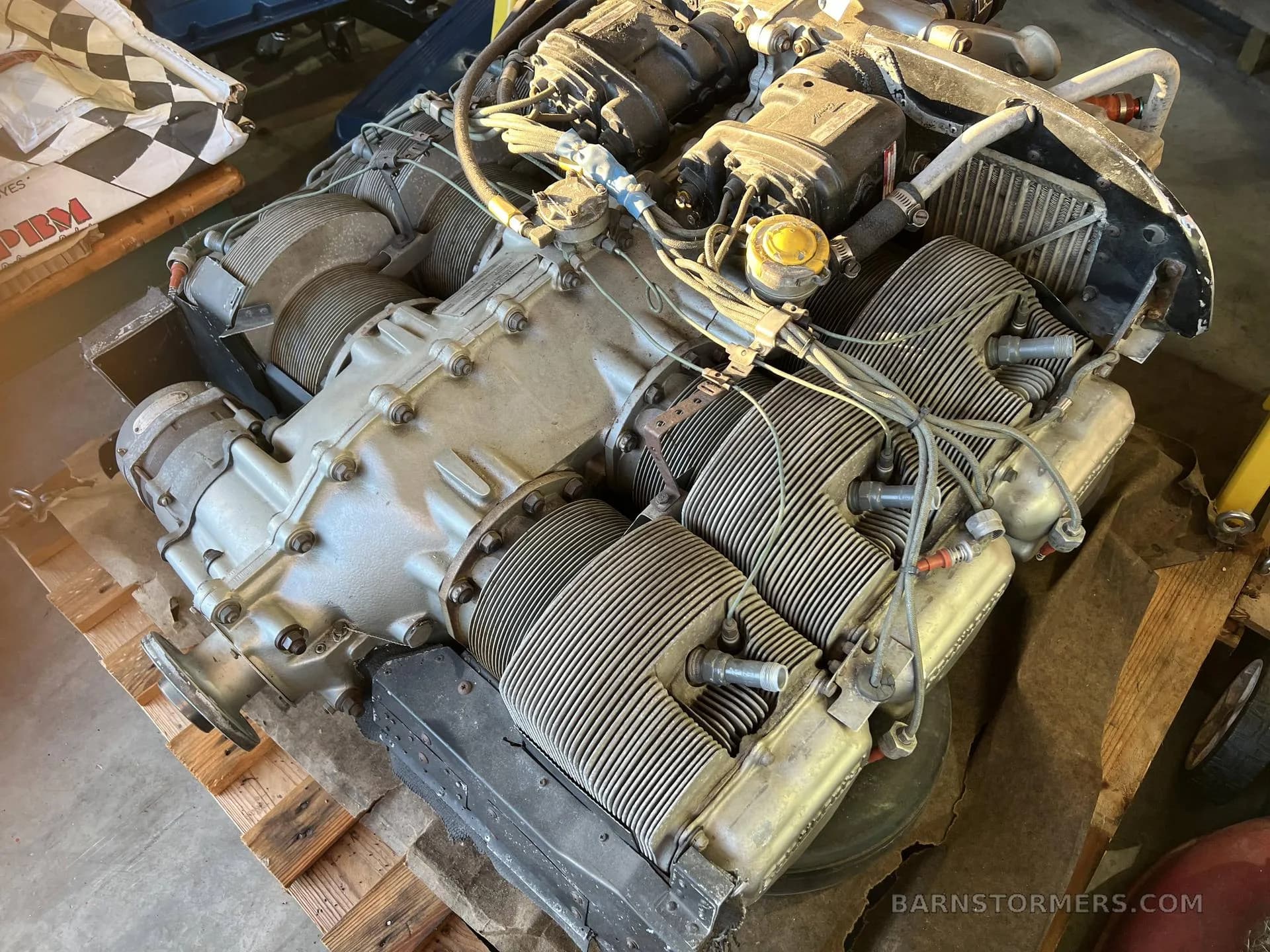 A close-up, angled view of a Teledyne Continental aircraft engine, highlighting its cylinders and main casing.