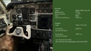 The cockpit of a Beech B90 King Air aircraft is shown with instrument panel details.