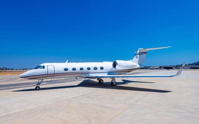 A Gulfstream G450 aircraft parked on the tarmac.