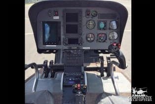 Close up of the instrument panel inside the helicopter cockpit.