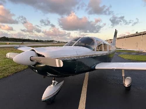 Front view of Piper PA-28-181 Archer II aircraft N1435T on the tarmac.