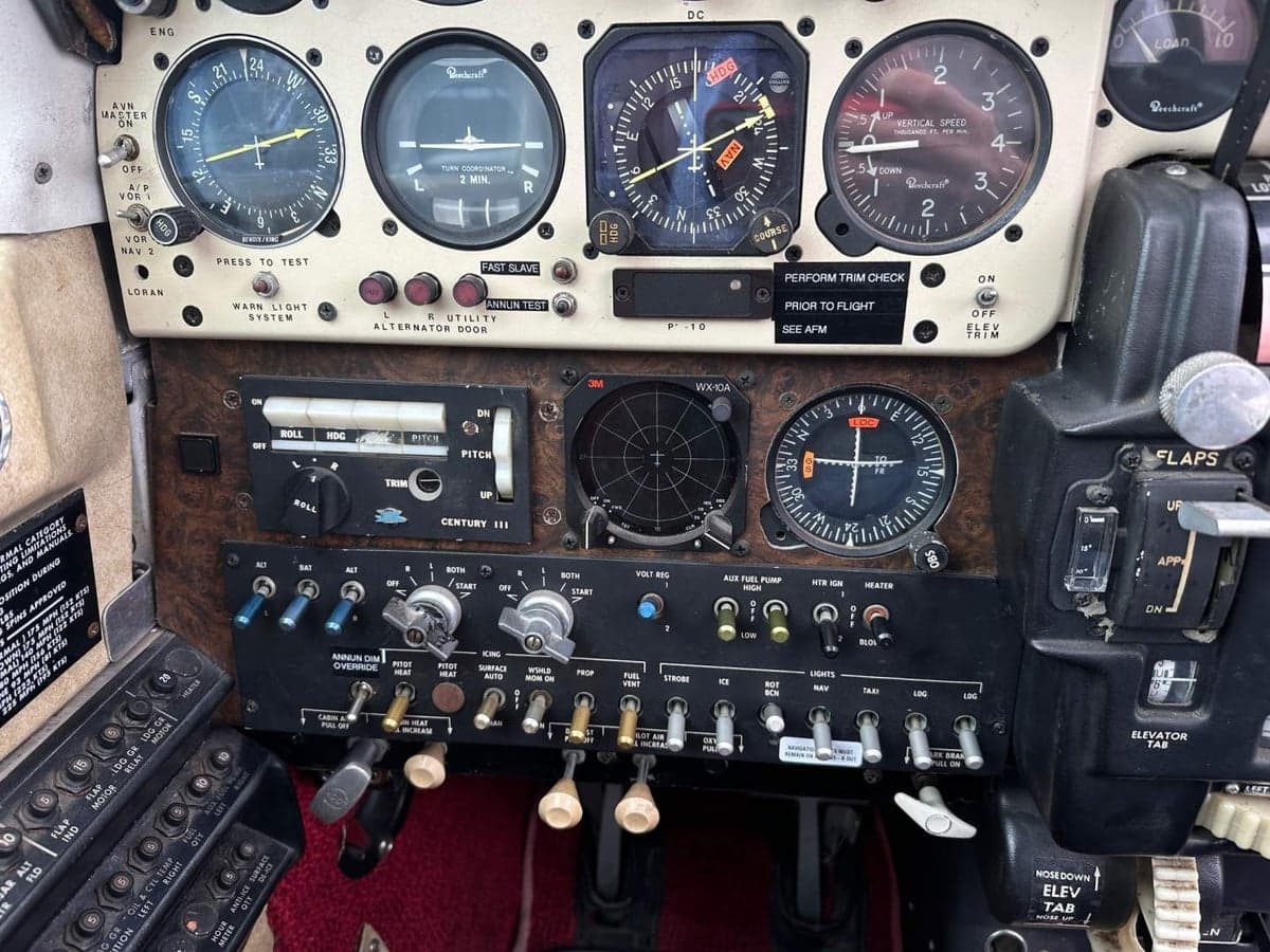 Close-up of the aircraft's instrument panel with various gauges and controls.