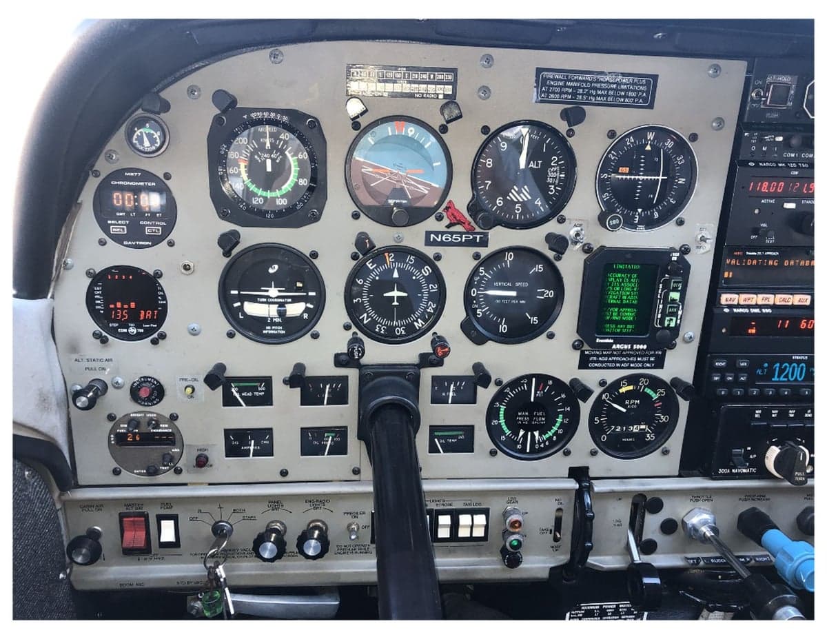 Close-up of the instrument panel in the cockpit of the aircraft.