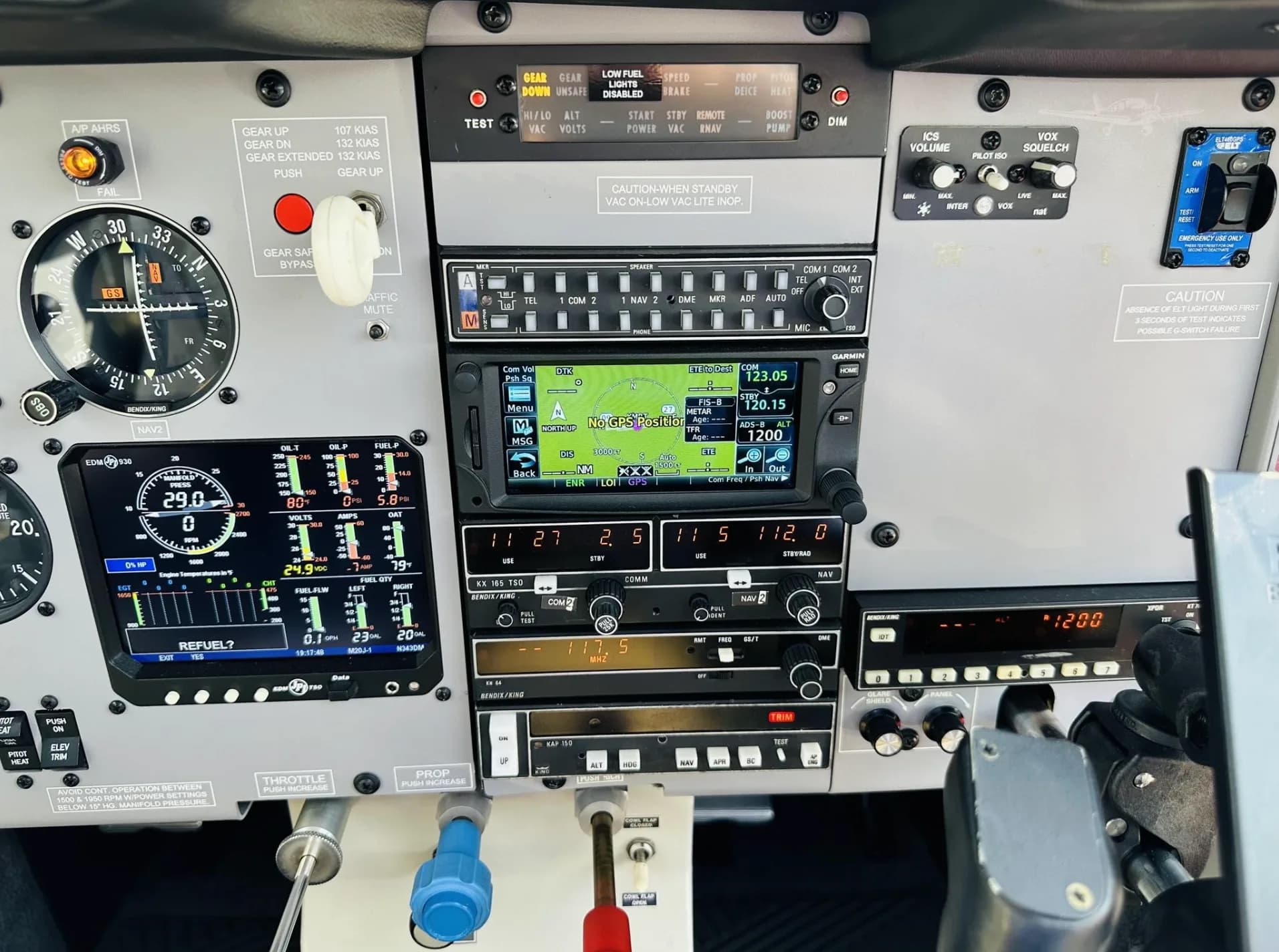 A detailed view of the center and right side of the Mooney aircraft's instrument panel, highlighting the navigation and communication radios.