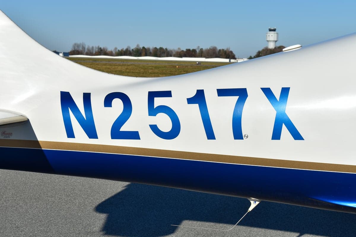 Cirrus VK-30 aircraft N2517X, side view on the ground.