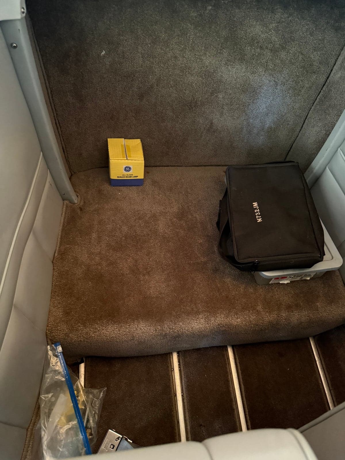 The interior of the aircraft showing the rear storage area.