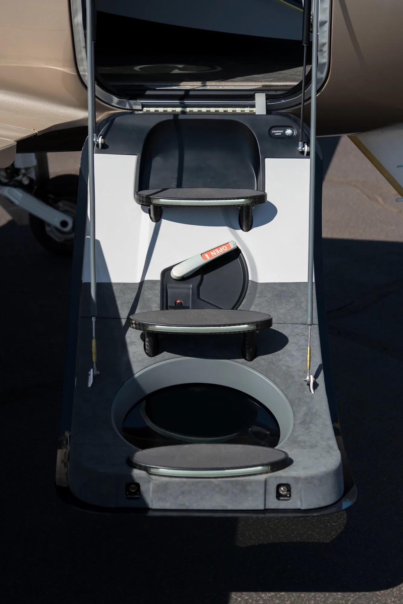 A close-up view of the integrated entry steps of the Epic E1000 GX aircraft.