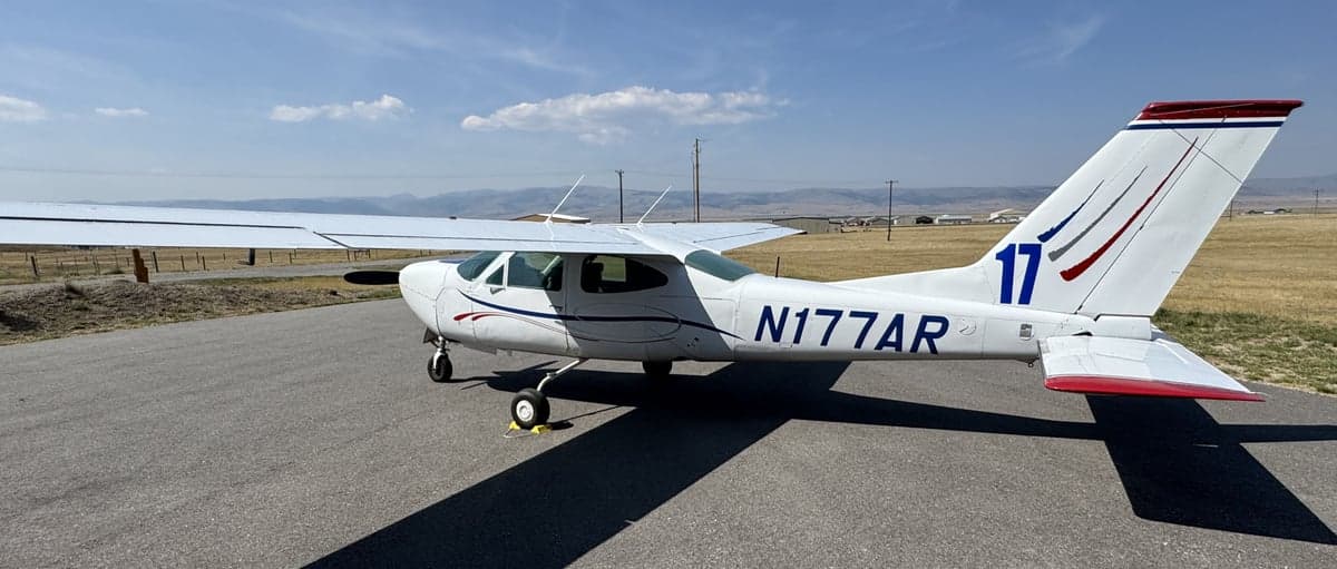 Side view of N177AR Cessna on the tarmac.